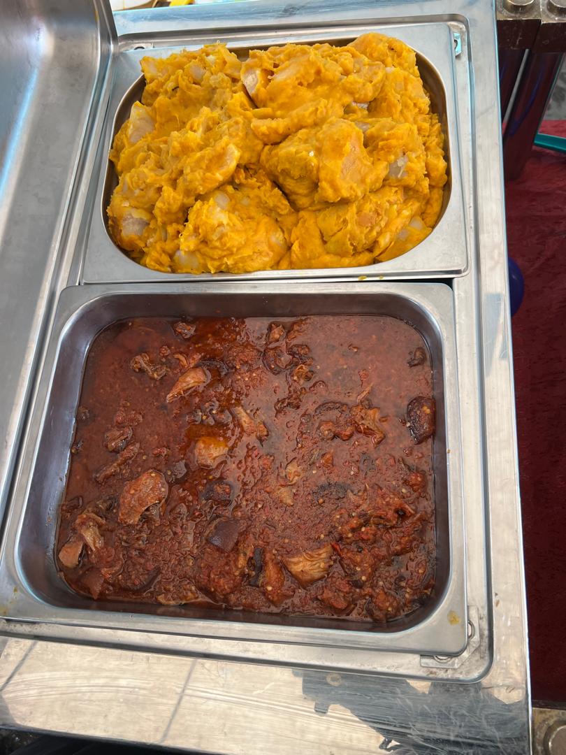 Yam porridge with assorted meat stew